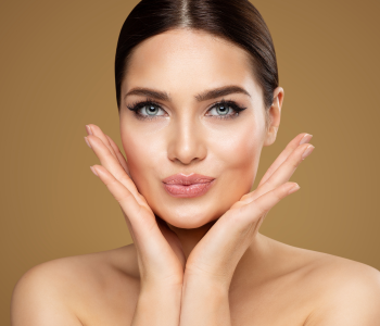 A pretty woman showcasing her natural-looking lip fillers